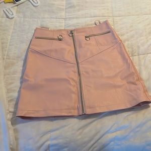 Faux leather pink mini skirt